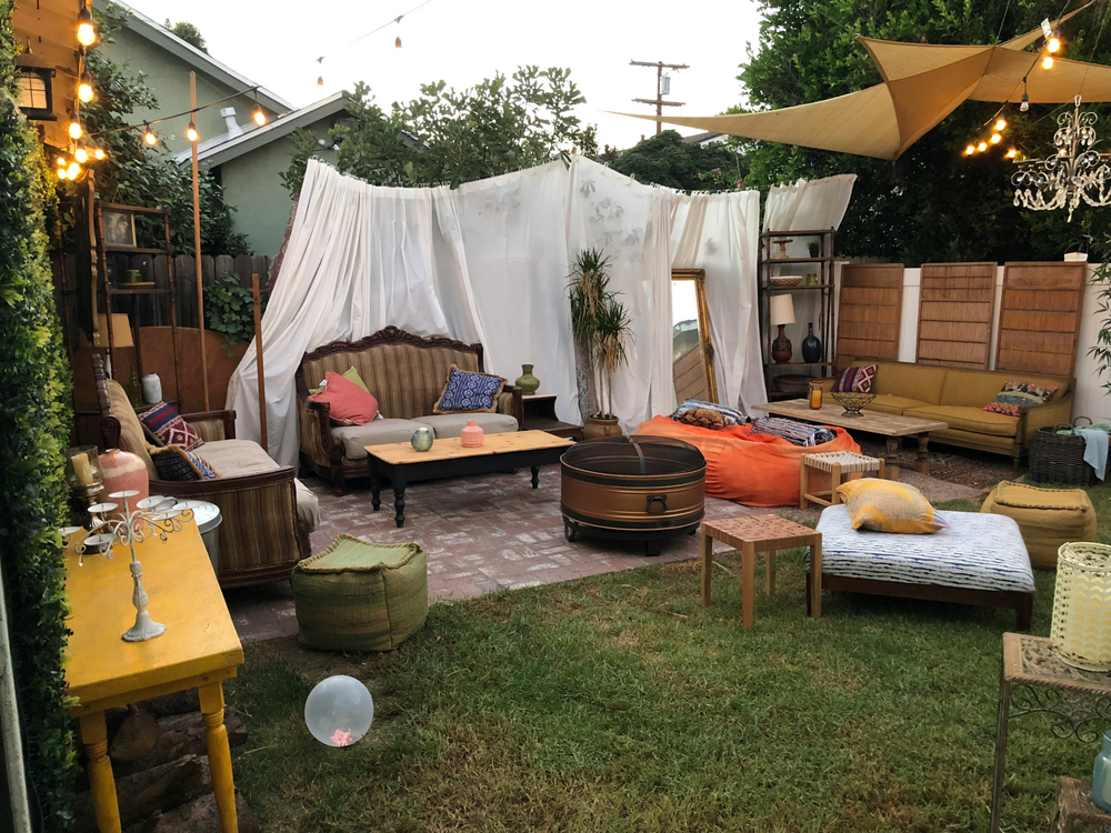 Outdoor seating with cushions set up for a Labor Day gathering