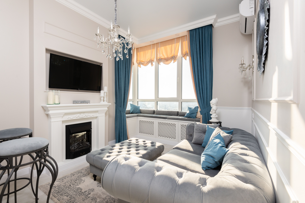 Layered living room with custom cushions and curtains
