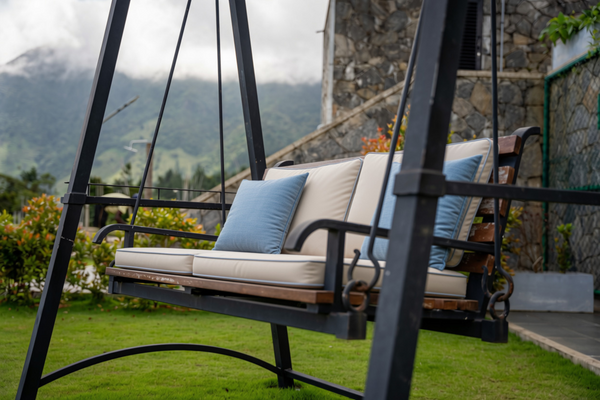 Resort daybed swing with outdoor cushions