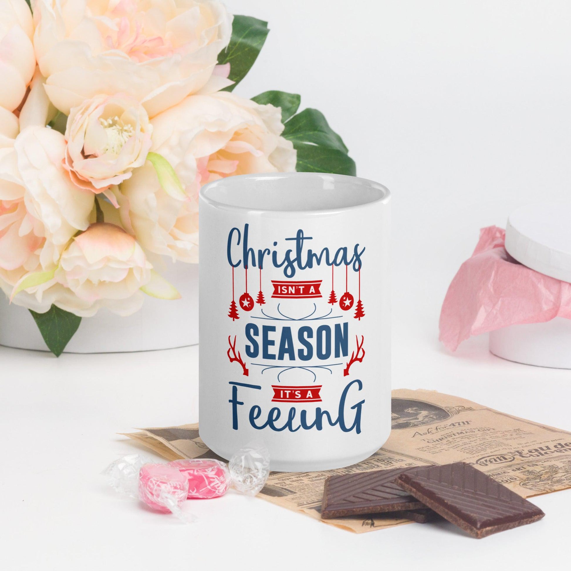 Warm Wishes in Every Sip: Experience the Festive Spirit with Our White Glossy Mug - 'Christmas Isn't a Season, It's a Feeling