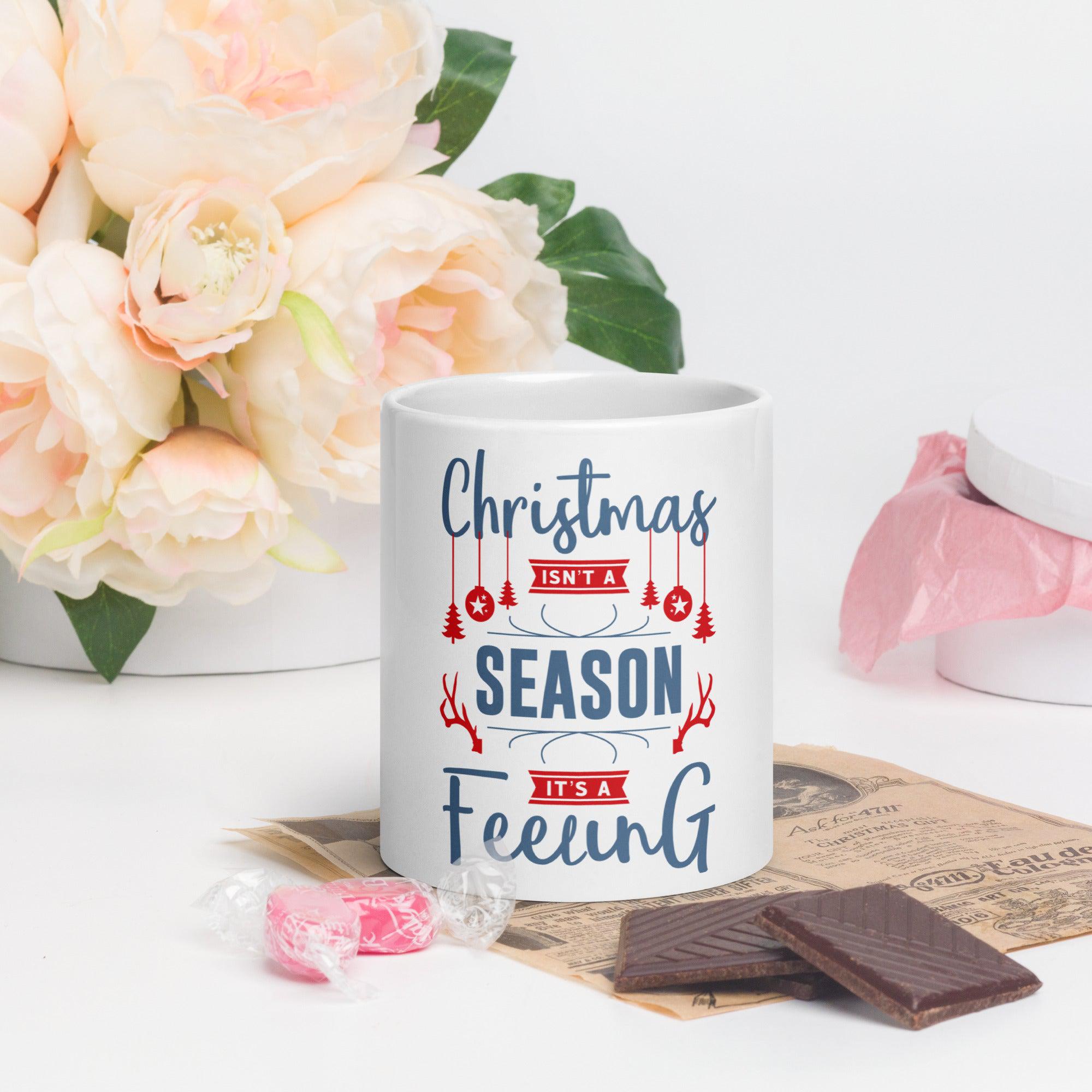 Warm Wishes in Every Sip: Experience the Festive Spirit with Our White Glossy Mug - 'Christmas Isn't a Season, It's a Feeling