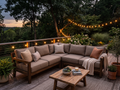 Custom taupe deep seat cushions on an outdoor sectional sofa on a deck at dusk