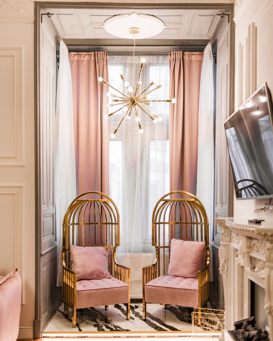 Velvet chair and curtains in a calm living room